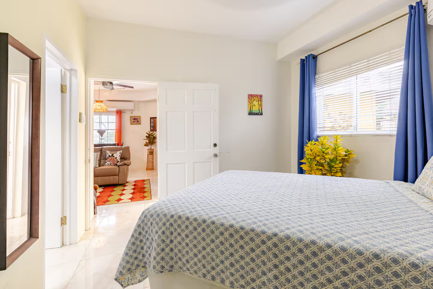 Second Bedroom with Modern Bedding, Air Conditioning & Window Light