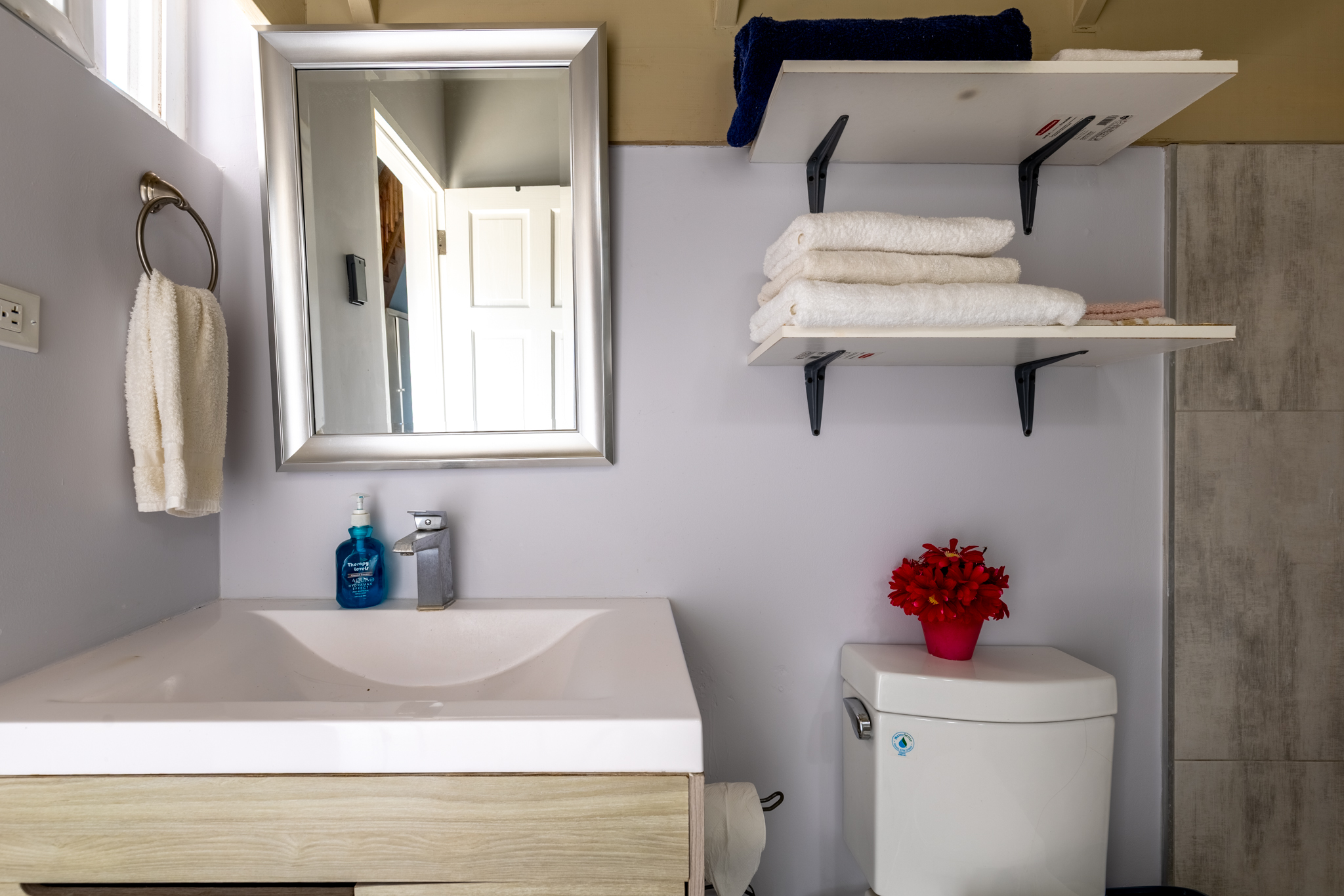 Lux Penthouse 207 gourmet kitchenette with quartz countertops and ocean view in Montego Bay