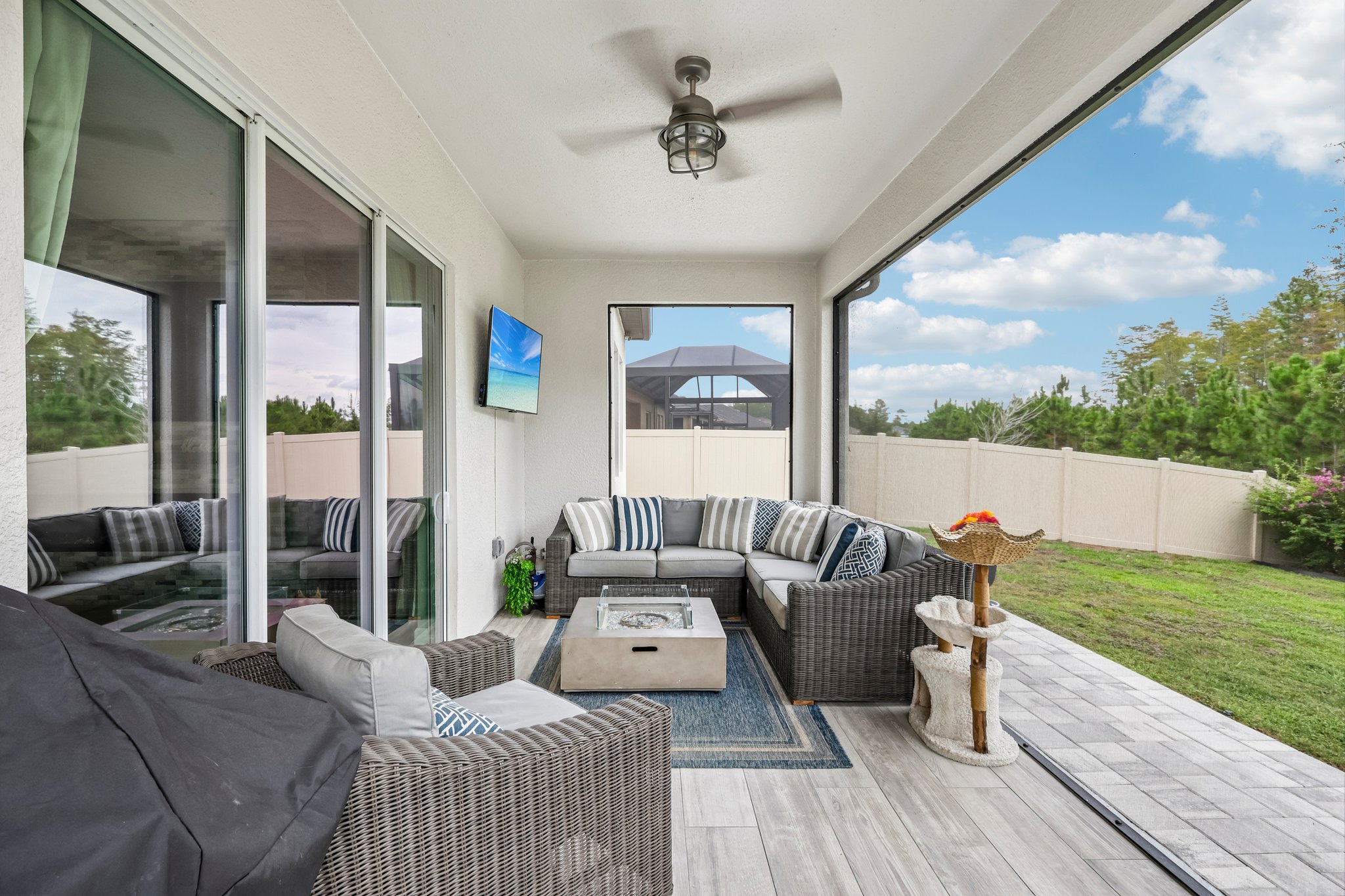 lanai seating area with the preserve beyond