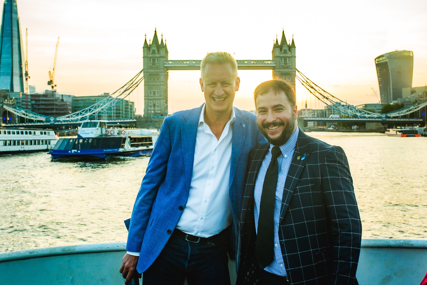 Russell Dalgleish and Alex Nedelea beside Tower Bridge in London