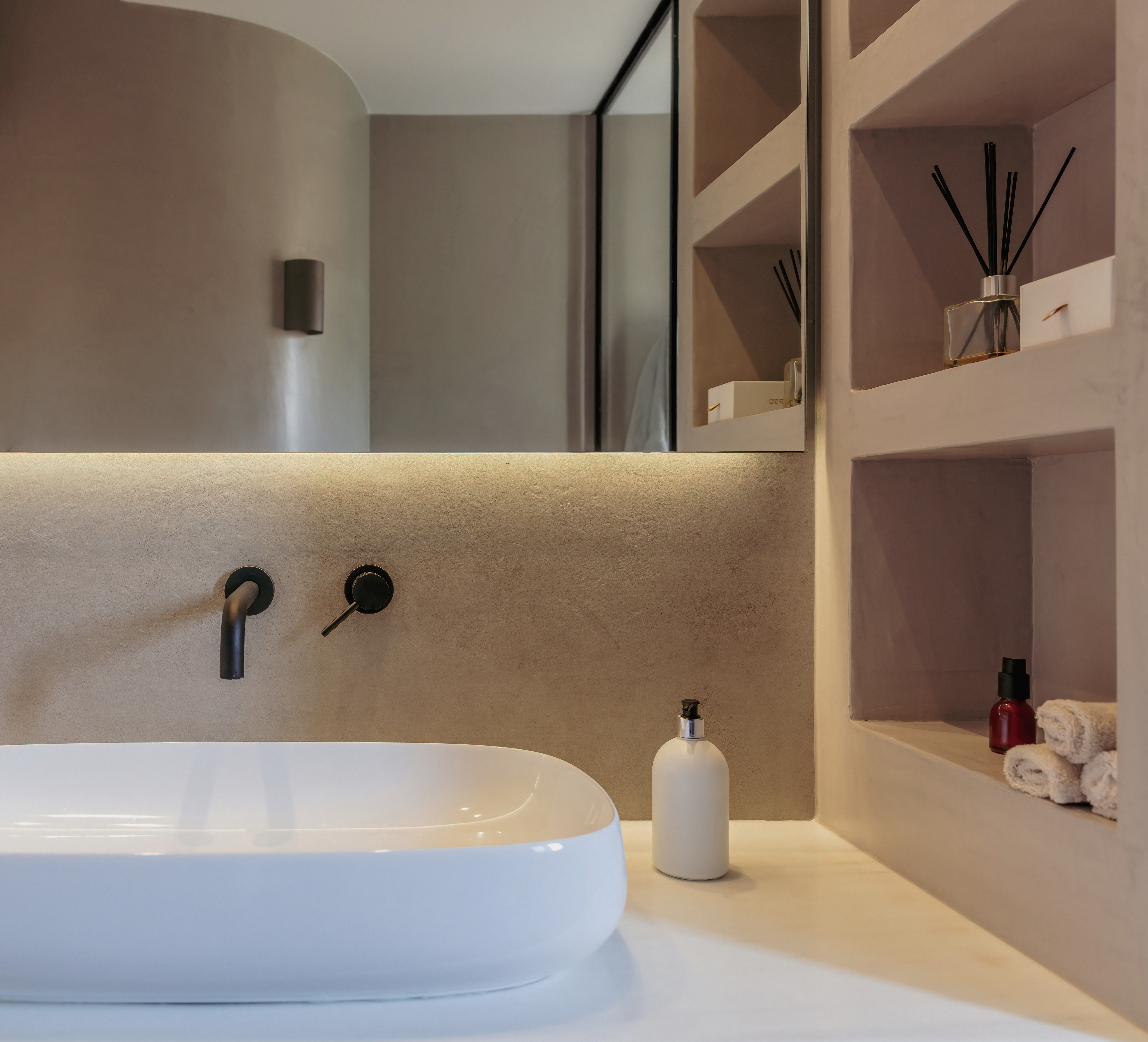 Microcement bathroom with seamless charcoal finish