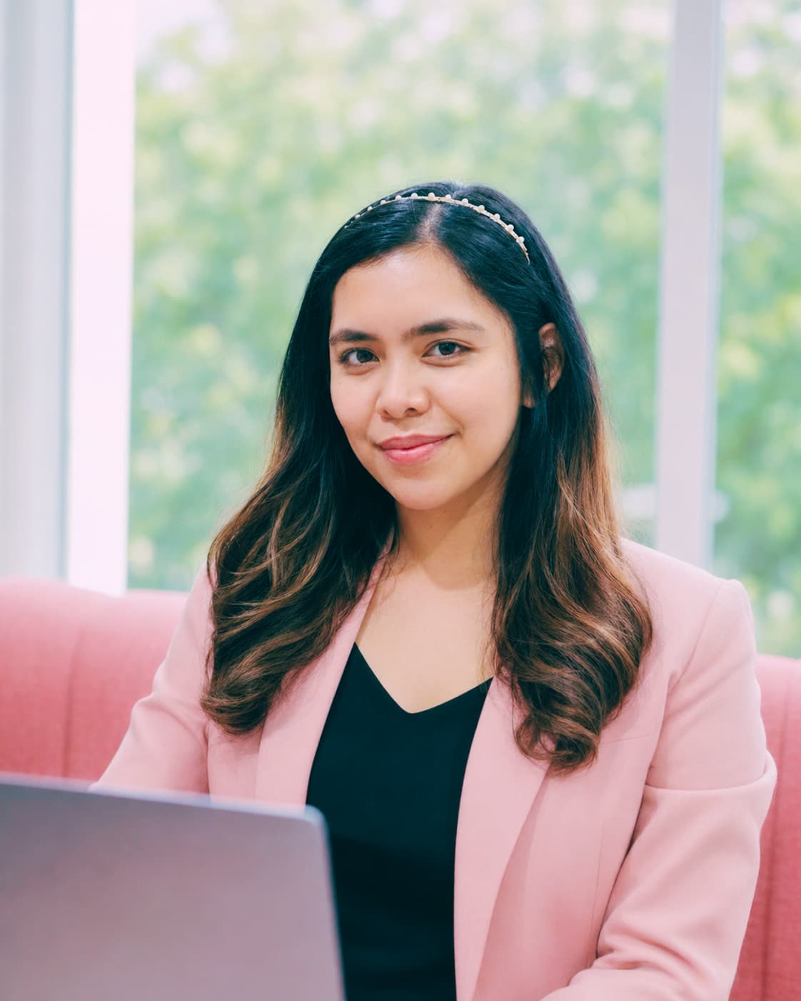 Ary, technical co-founder of Bloomwired, at her desk