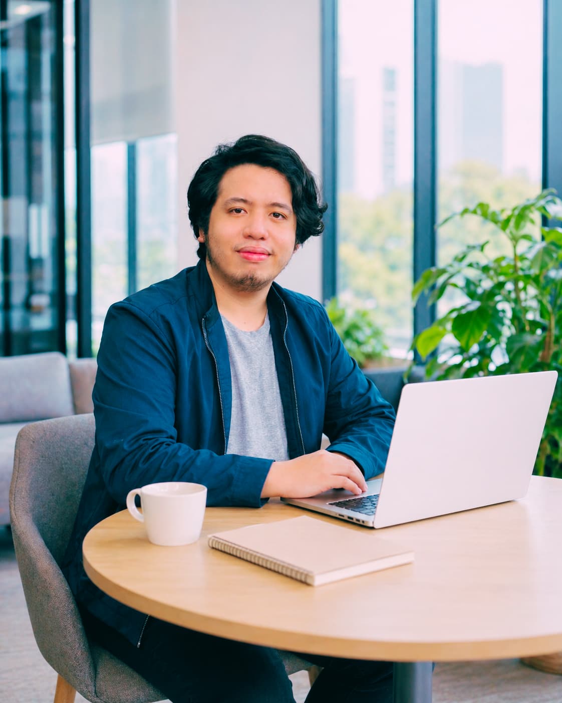 Brixon, visual co-founder of Bloomwired, at his desk