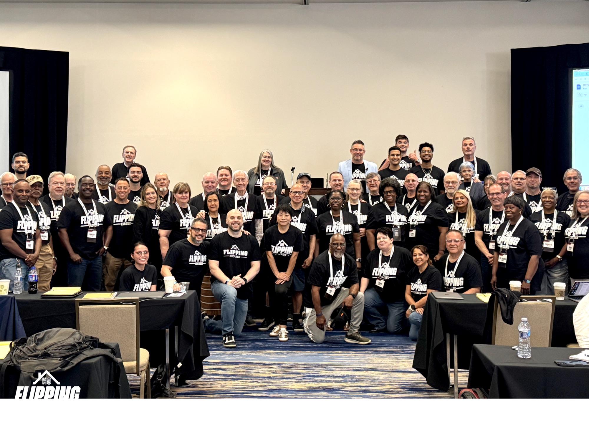 Members and the No Flipping Excuses team at a past Mastermind