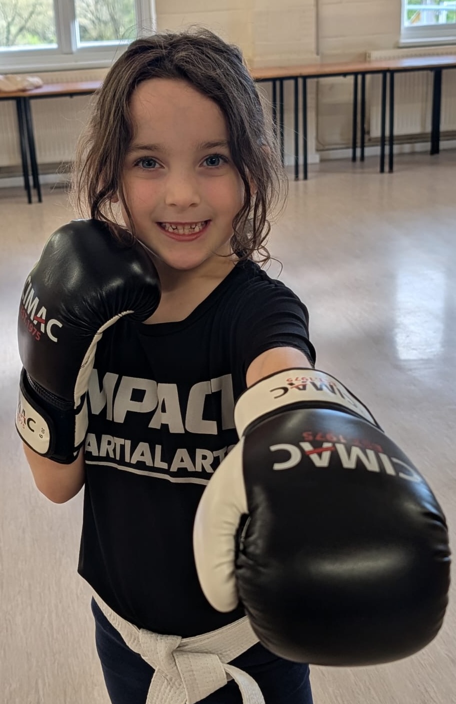Child posing in a Jab stance.