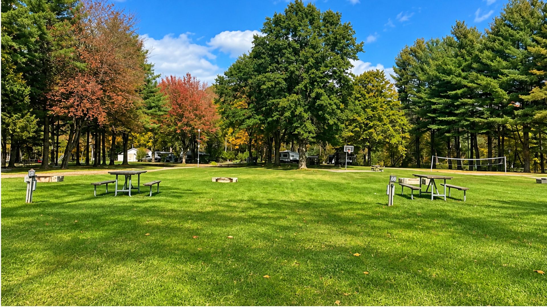 Wooded full-hookup RV campsite at West Canada Creek Campground in Poland, New York