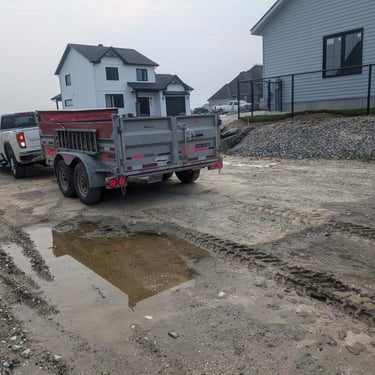 Livraison de vrac sable gravier roche Rive-Sud, camion dompeur EBI
