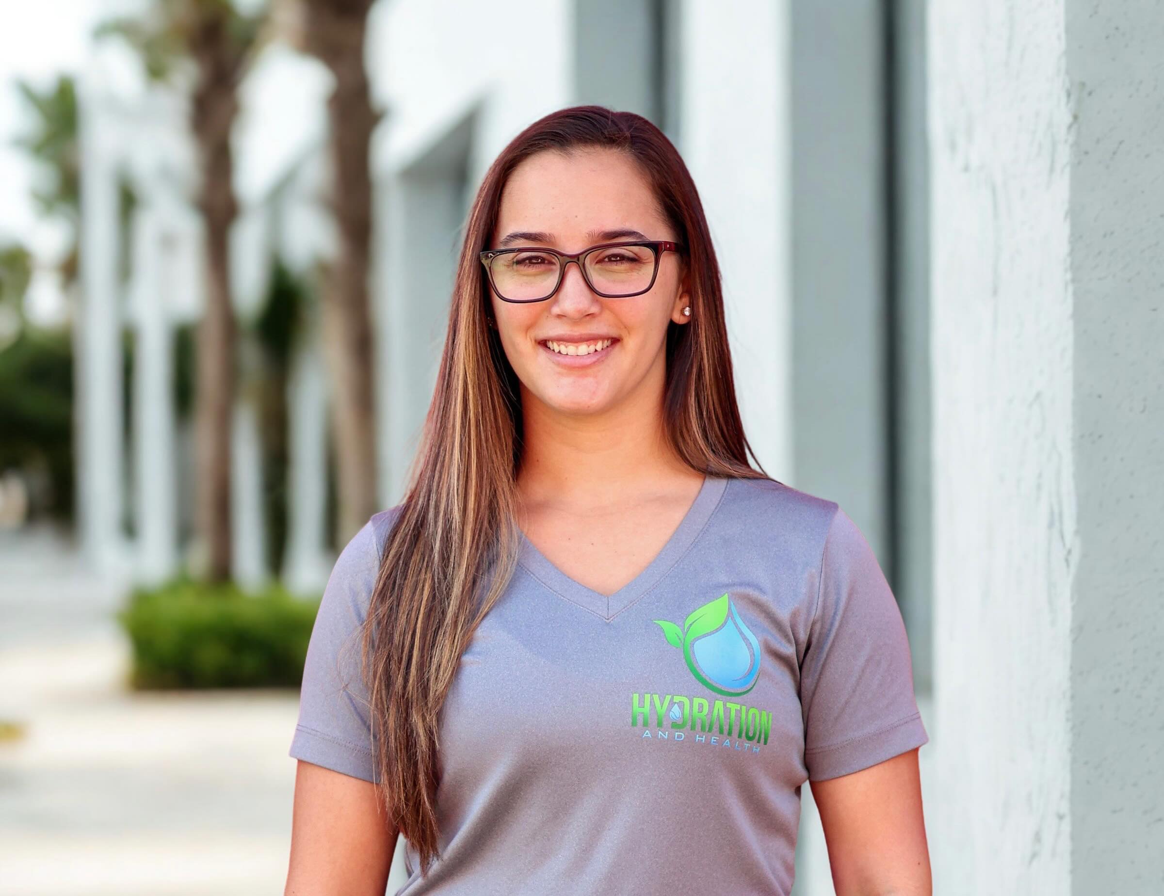 Nurse Mia, registered nurse and founder of Hydration & Health, smiling