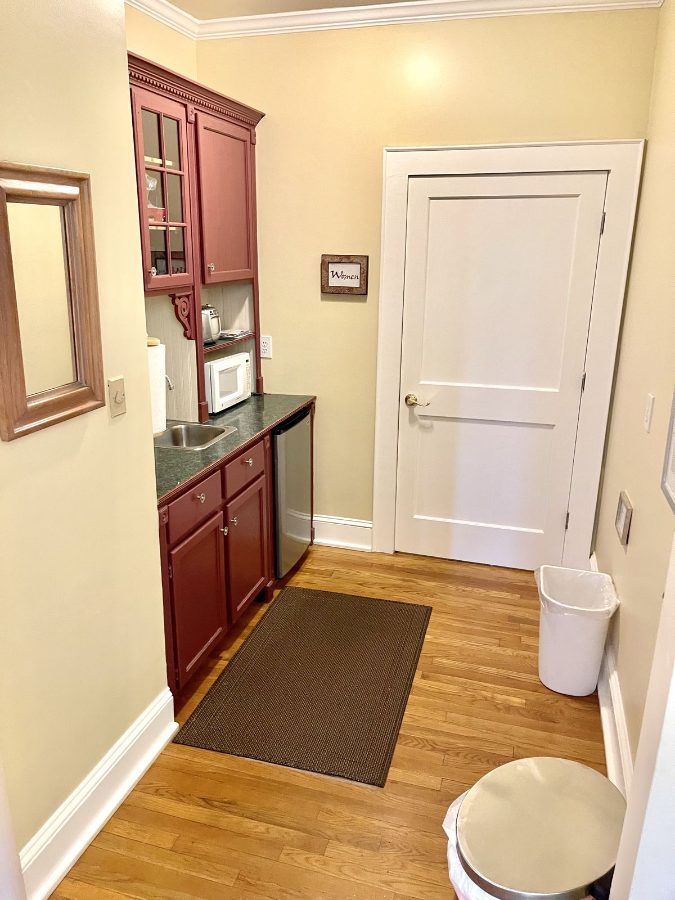 Break room at The 440 with sink, microwave, refrigerator and counter space