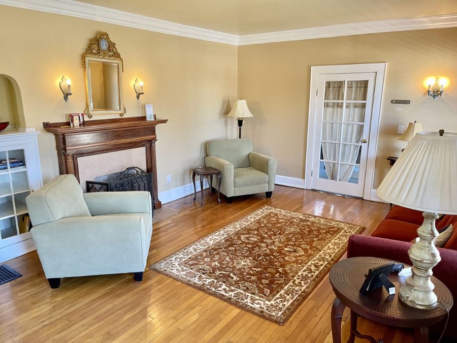 Main lobby at The 440 with hardwood floors, fireplace and French doors to the suites