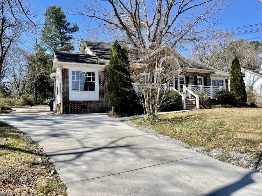 Side view of The 440 showing the driveway and side entrance