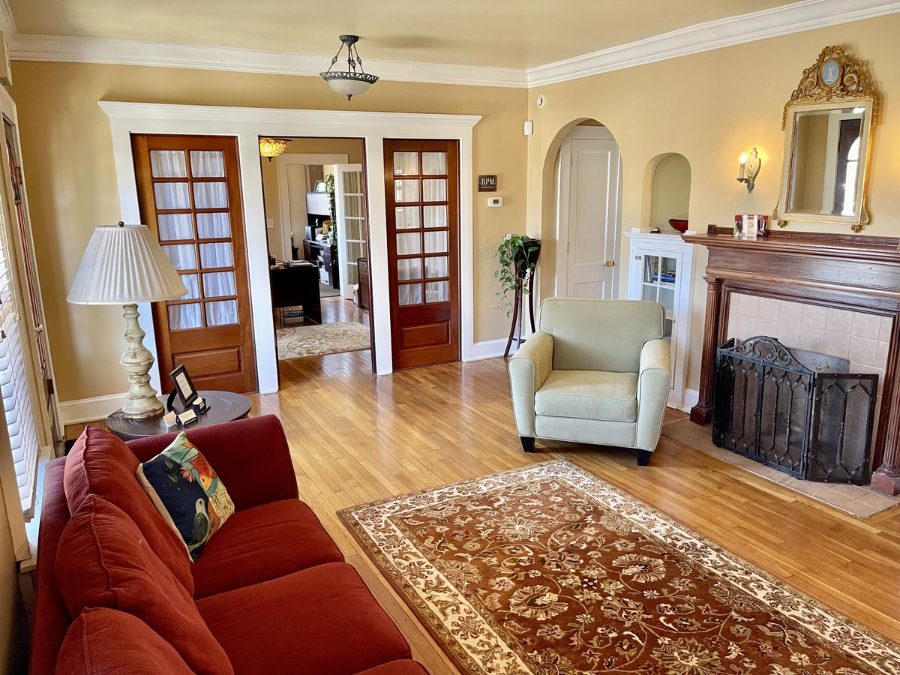 Lobby seating area at The 440 around the original mantel and fireplace