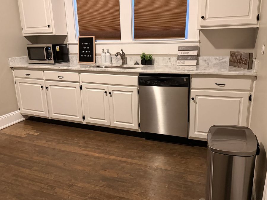 Break room at The 490 with granite counters and stainless appliances