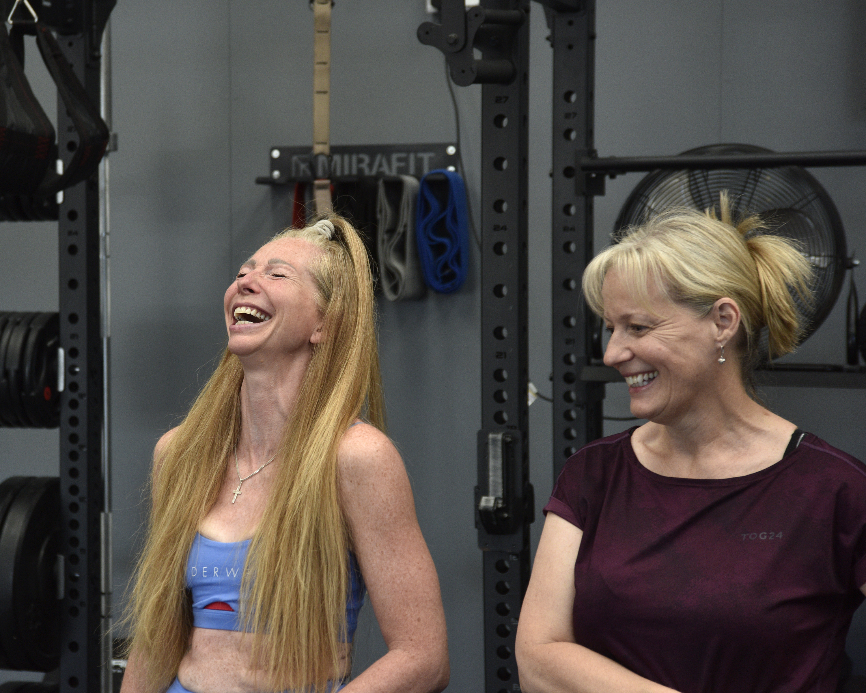 A coach working closely with a client at Body Transformation Centre