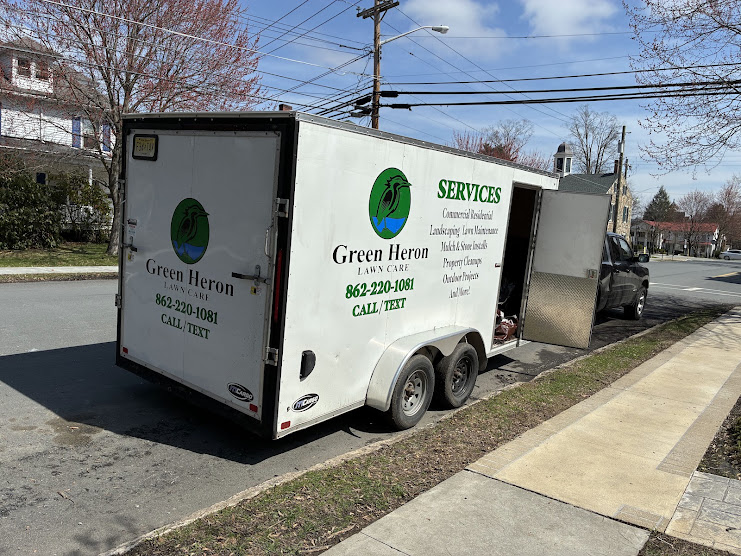 Green Heron Lawn Care equipment and crew ready for work in Sussex County NJ