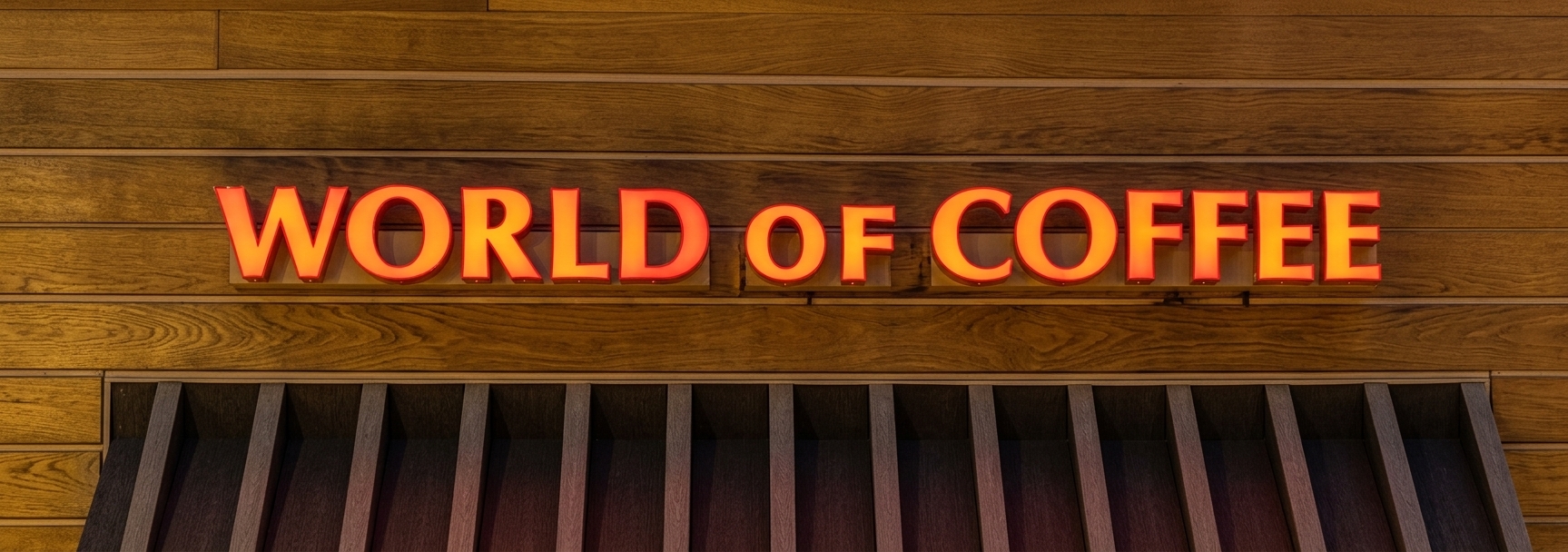World of Coffee Orlando café logo