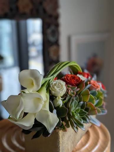 Athletic Club Flower Shop — a carefully arranged bouquet of flowers