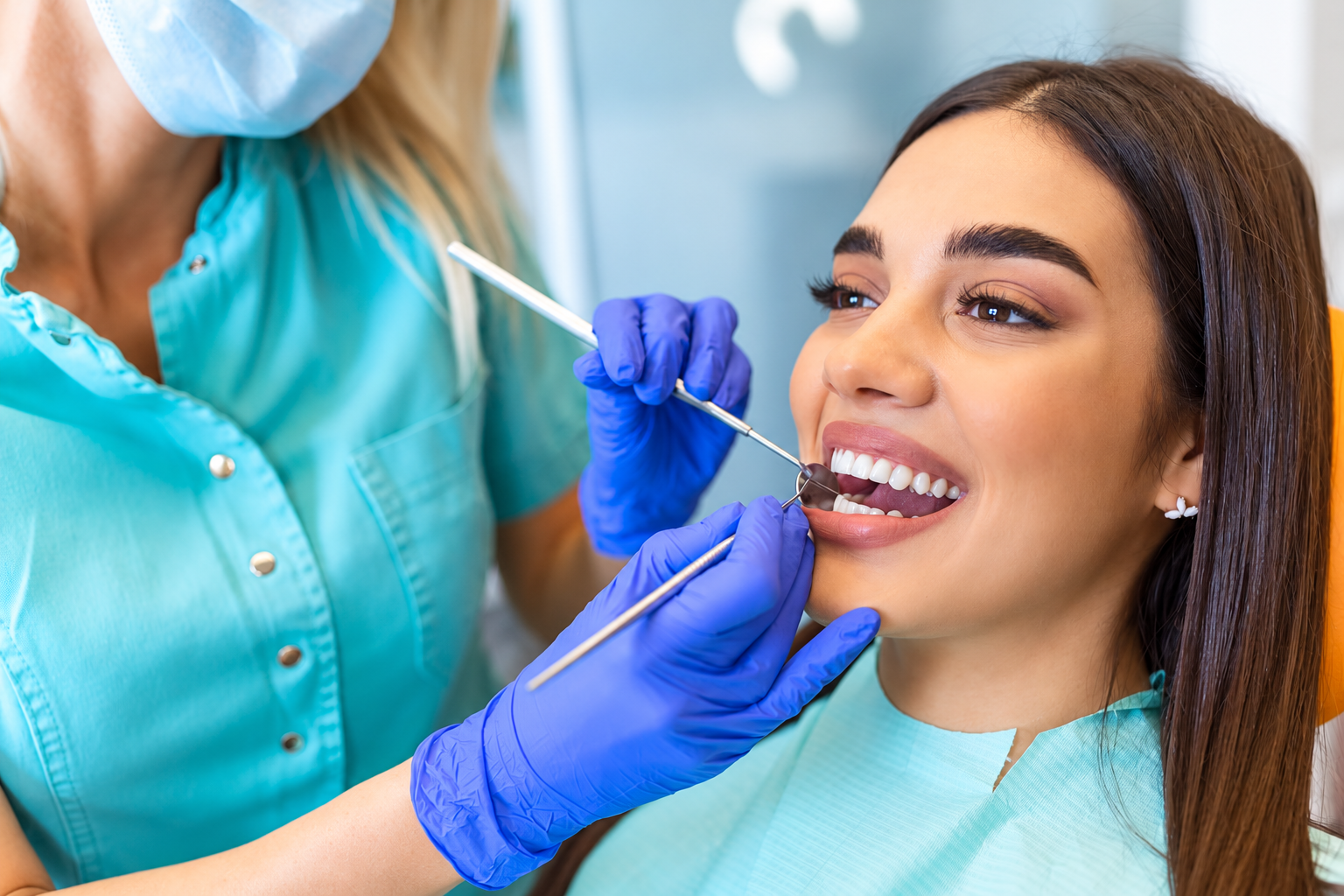 Friendly dental professional conducting an oral examination