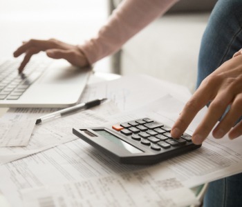 Financial paperwork and calculator