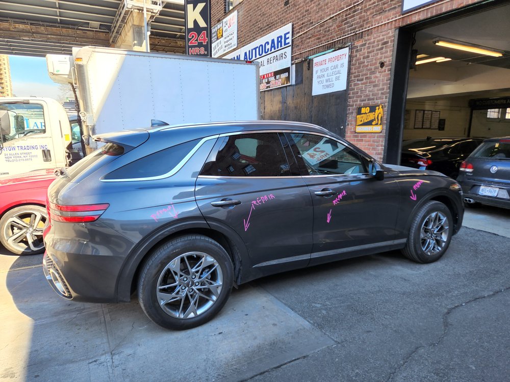 SUV undergoing exterior repair assessment
