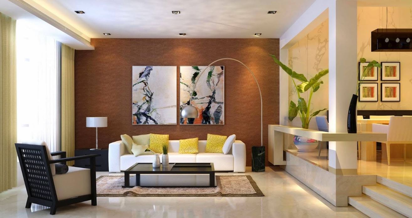Shared indoor lounge with seating, artwork and a fireplace