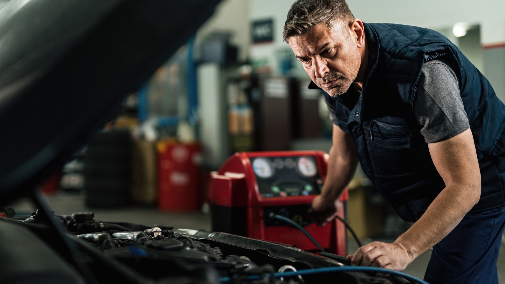 Inside the JC Auto Repair Shop service bay in Dallas, Texas
