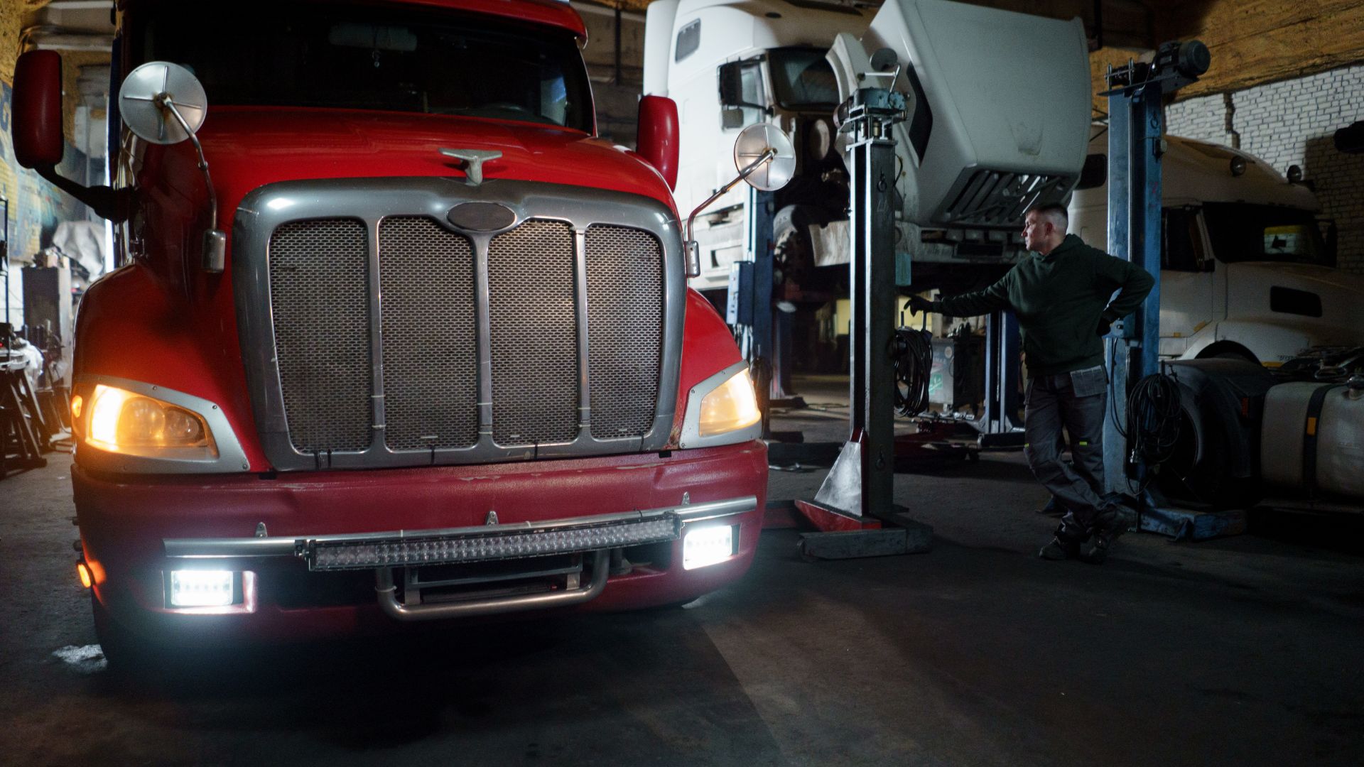 Technician at work in the JC Auto Repair Shop service bay, Dallas, Texas