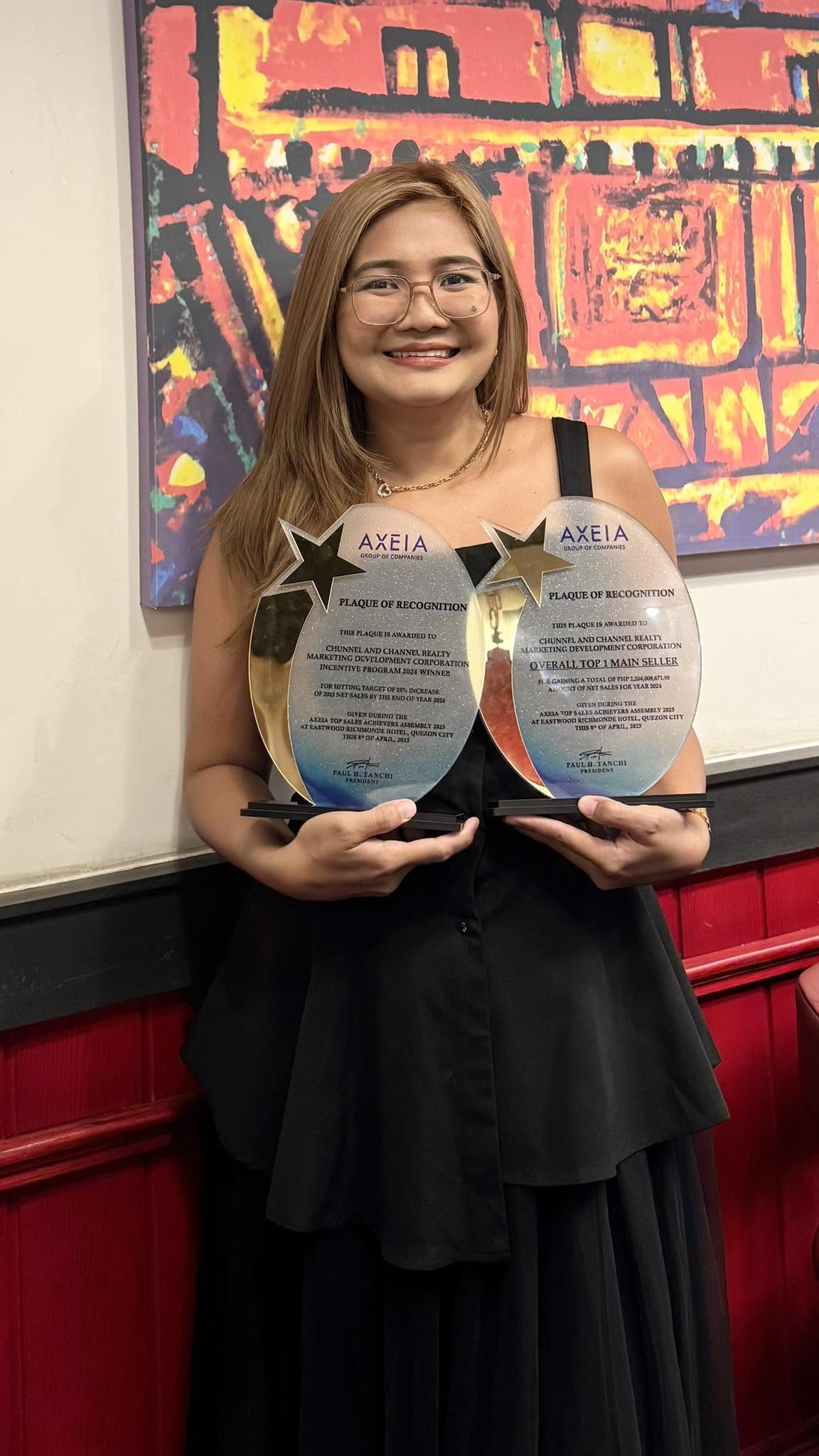 Host portrait supplied by Midori Antipolo BnB featuring an awards presentation