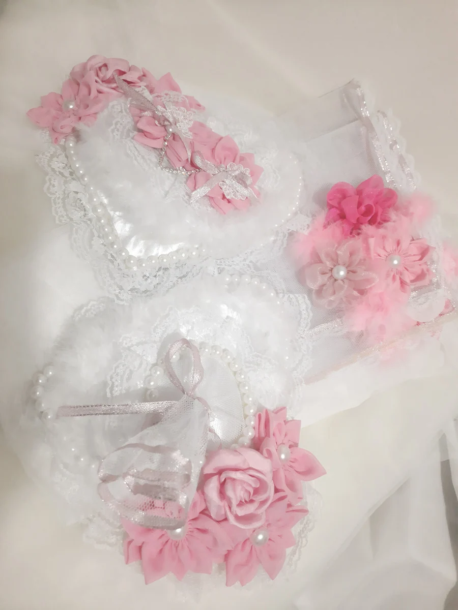Handcrafted pastel pink wedding essentials and accessories