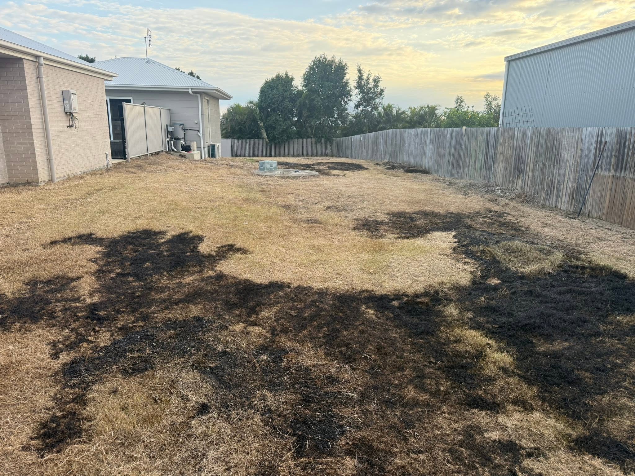 Before: the same yard before the work (project 3)