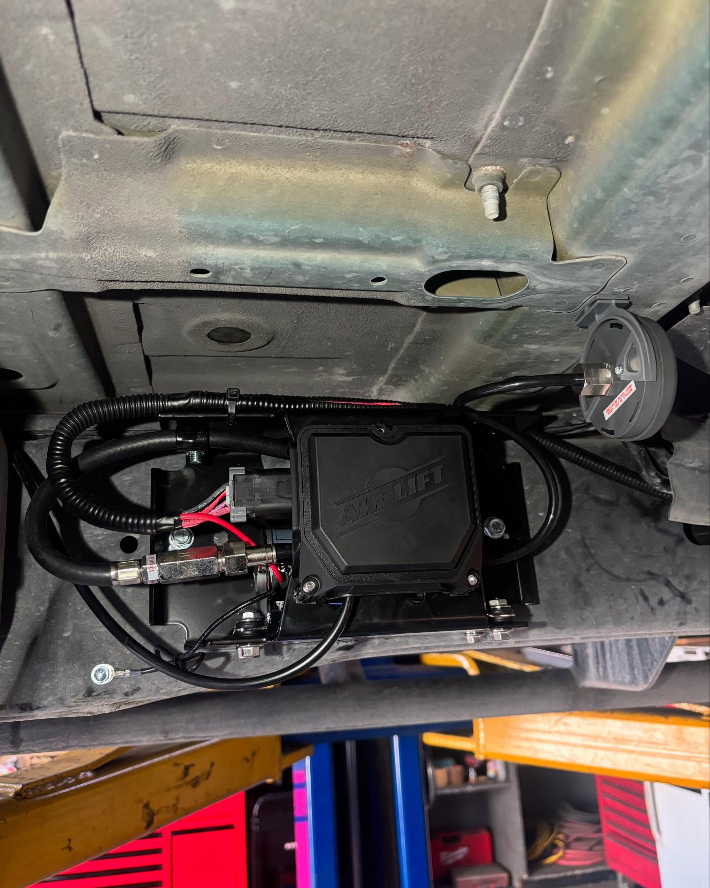 Air Lift Performance compressor install, built at Top Trucks of Central Florida in Longwood, FL