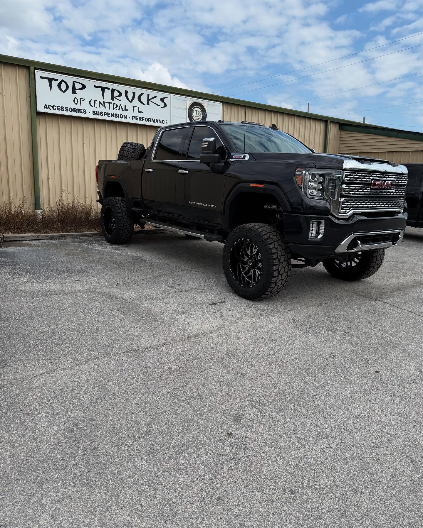 Lifted GMC Sierra 2500 Denali HD, built at Top Trucks of Central Florida in Longwood, FL