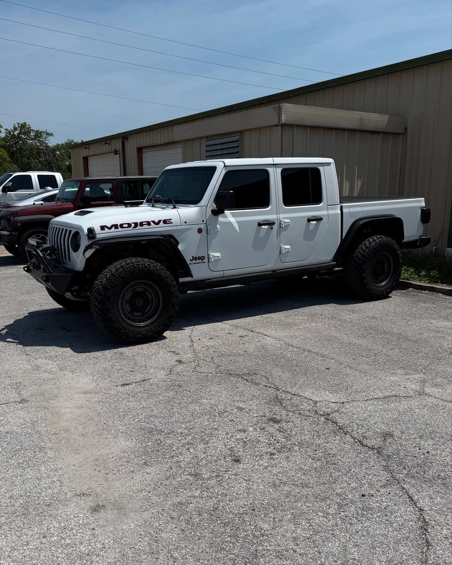 Lifted white Jeep Gladiator