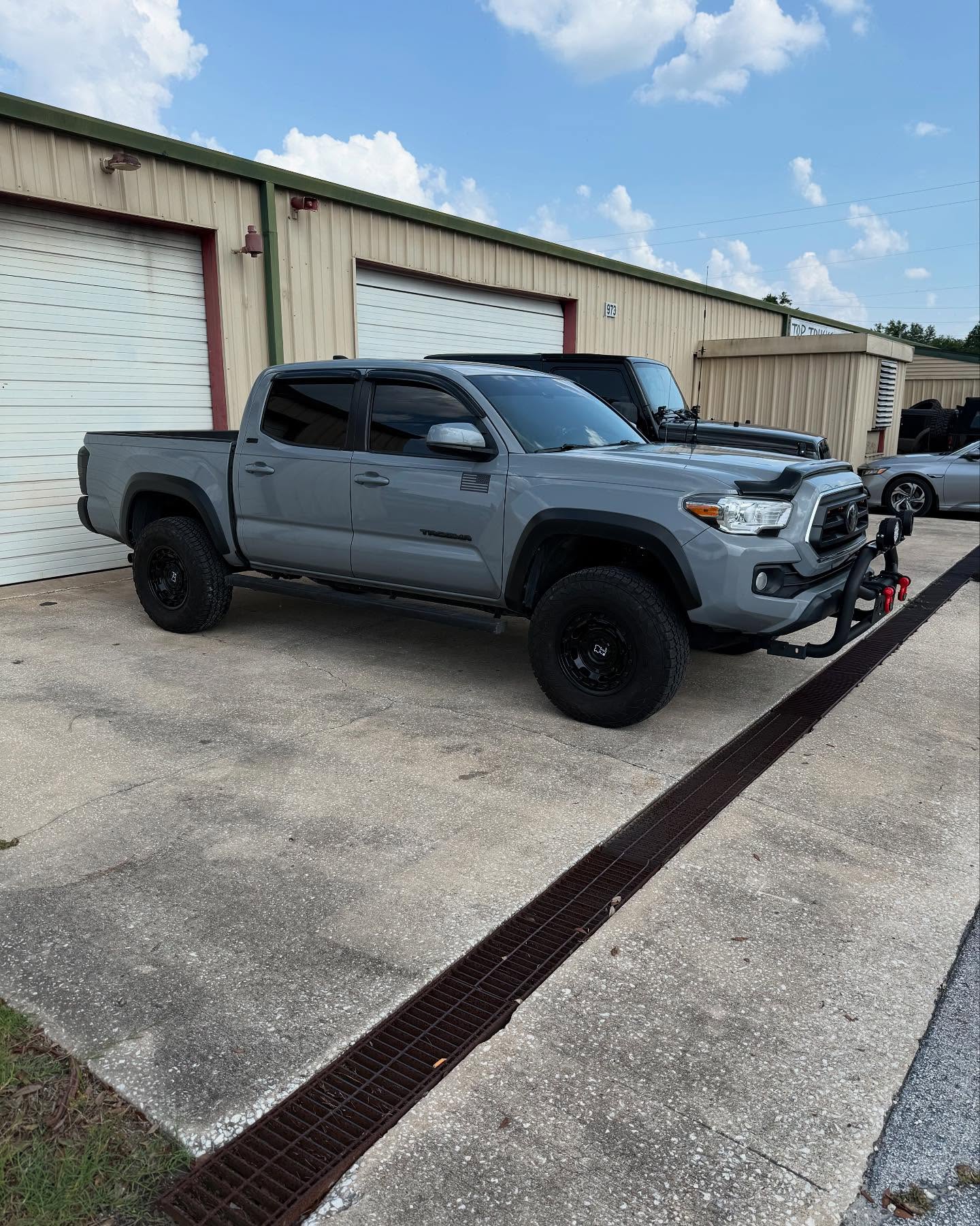 Lifted gray Toyota Tacoma