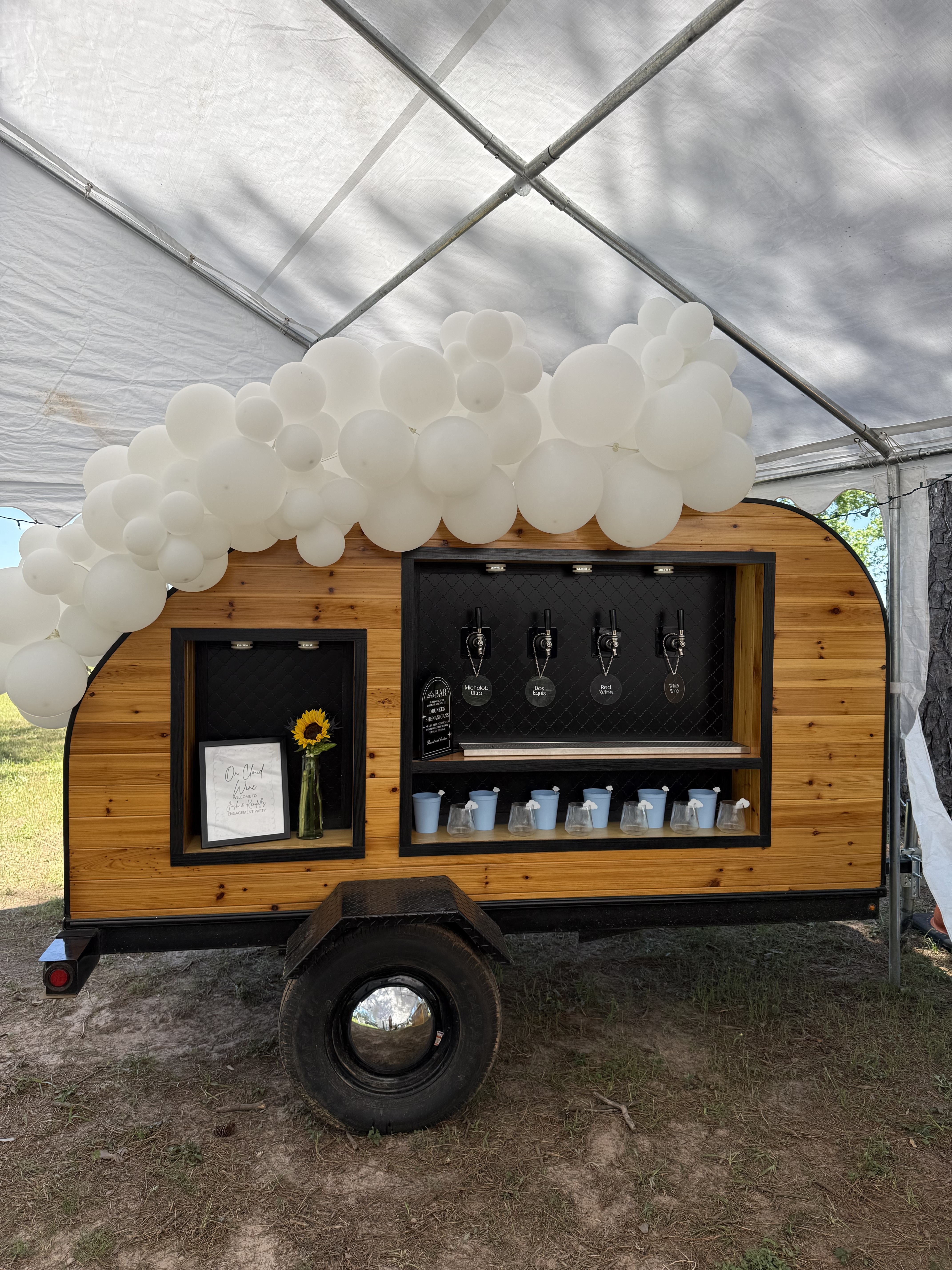 Wedding reception with mobile bar in sunset light