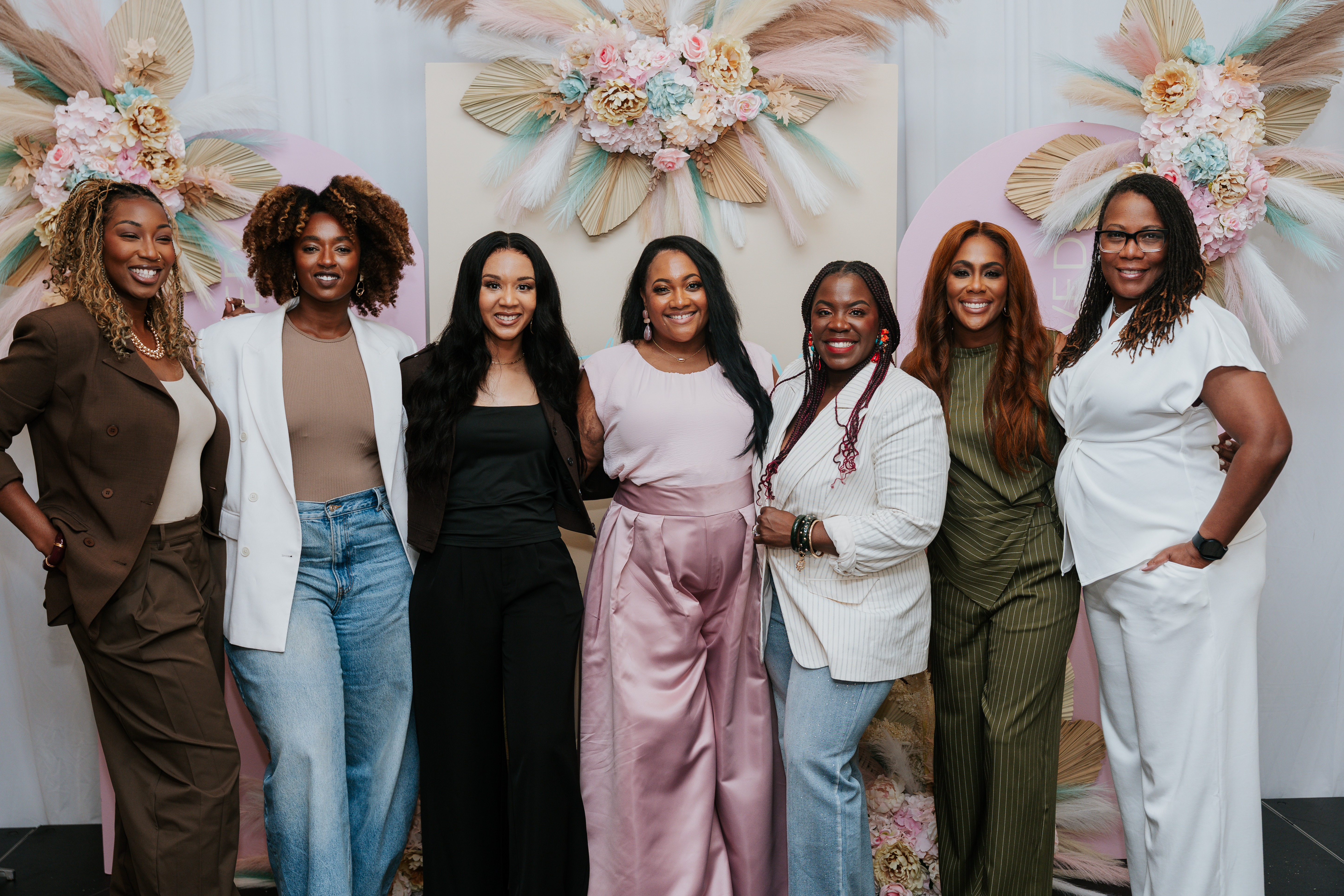 Ieshia Danielle in the room with women at a live event