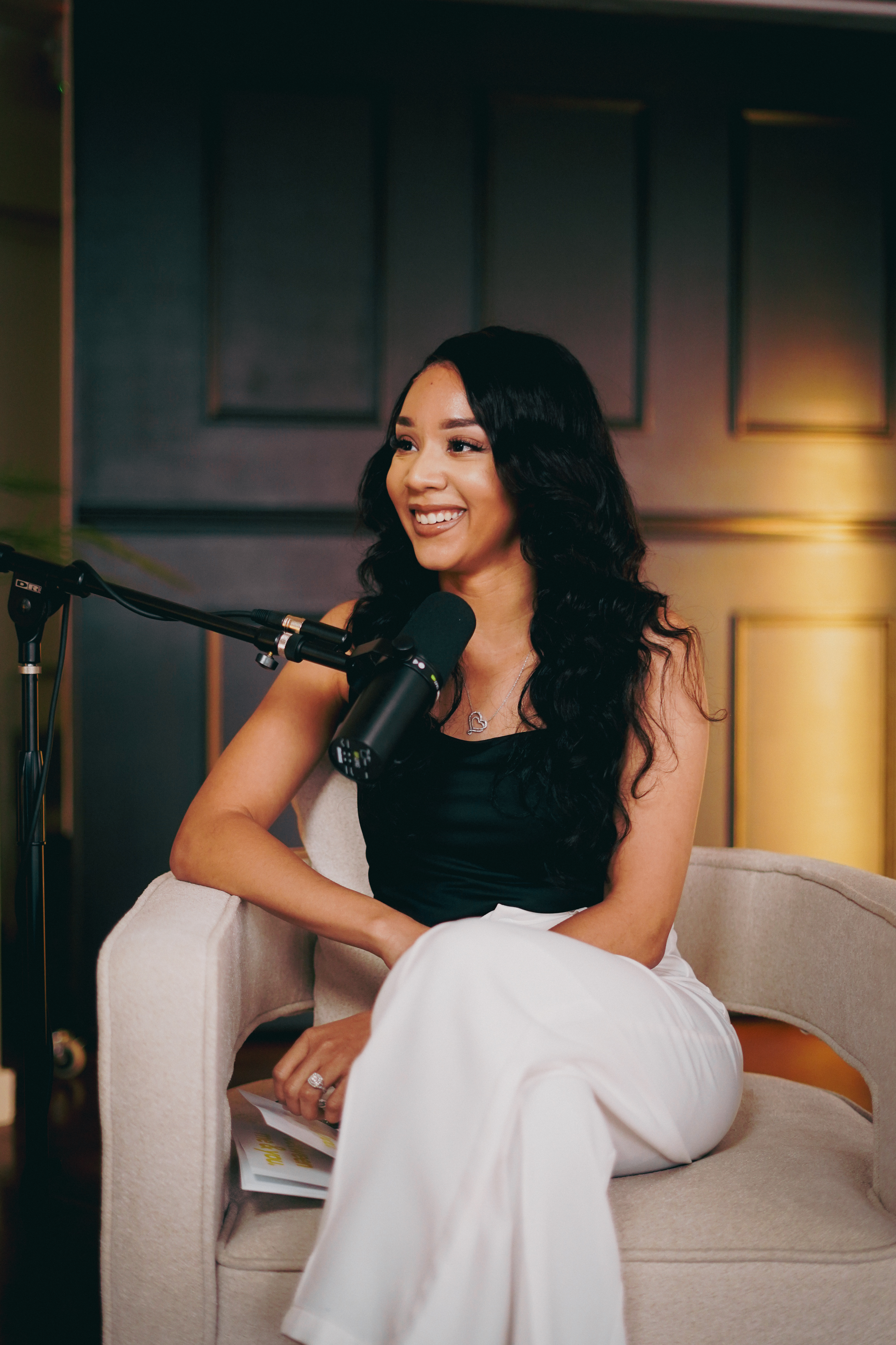 Ieshia Danielle recording in the Between Me & You podcast studio