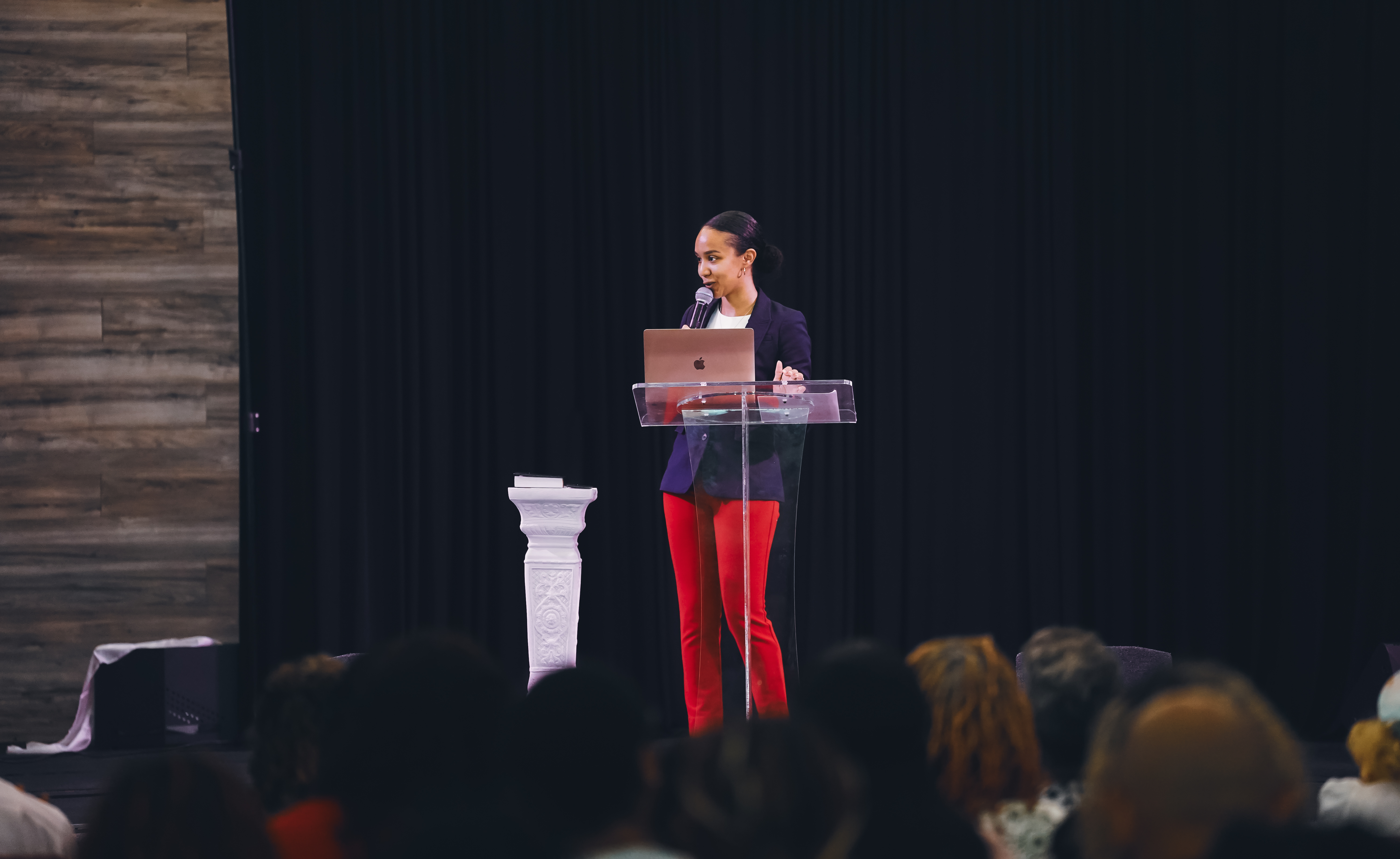 Ieshia Danielle teaching on stage during the Becoming Intensive