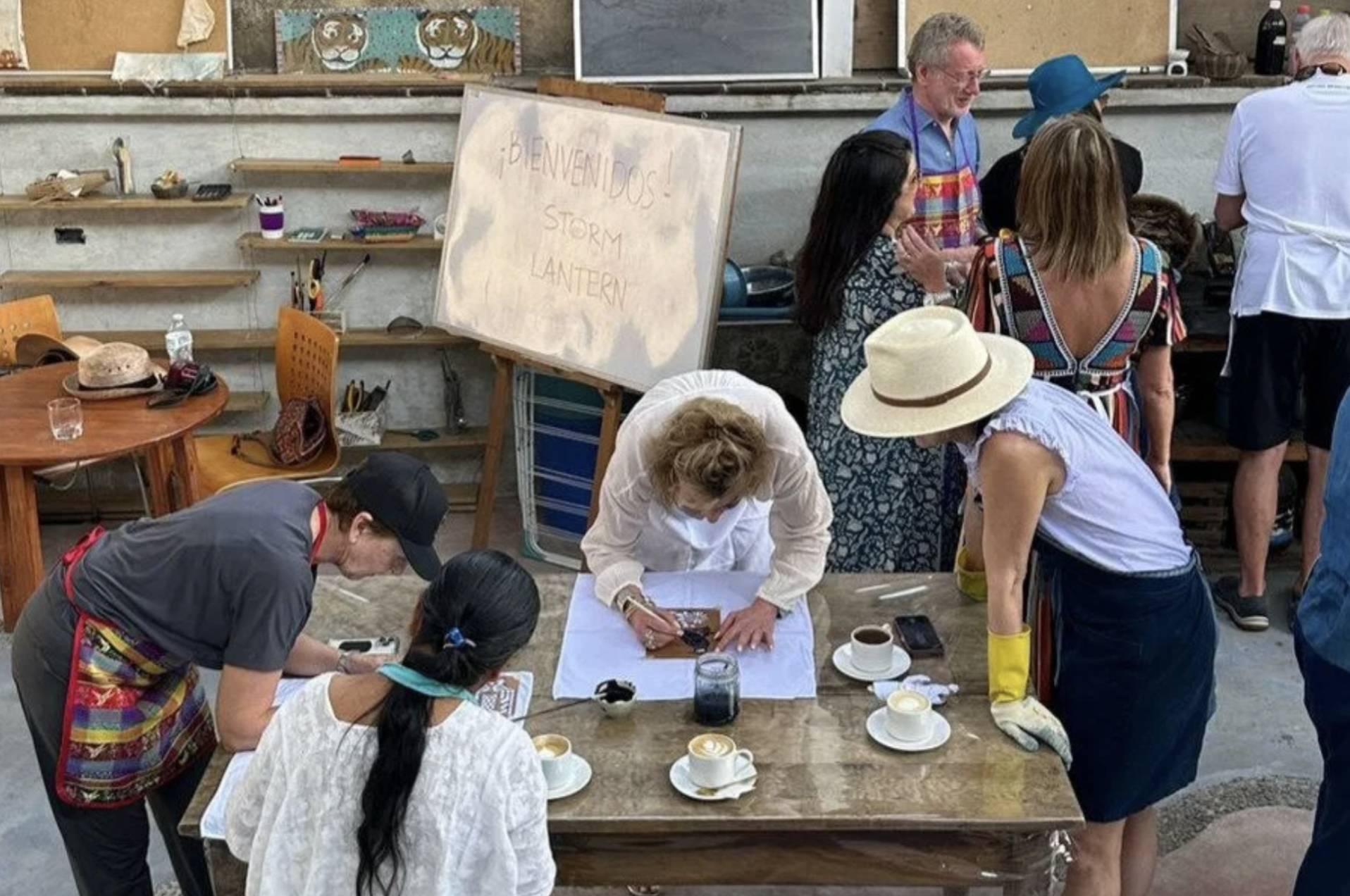 A group of people are participating in a natural Indigo dye workshop in Antigua, Guatemala.