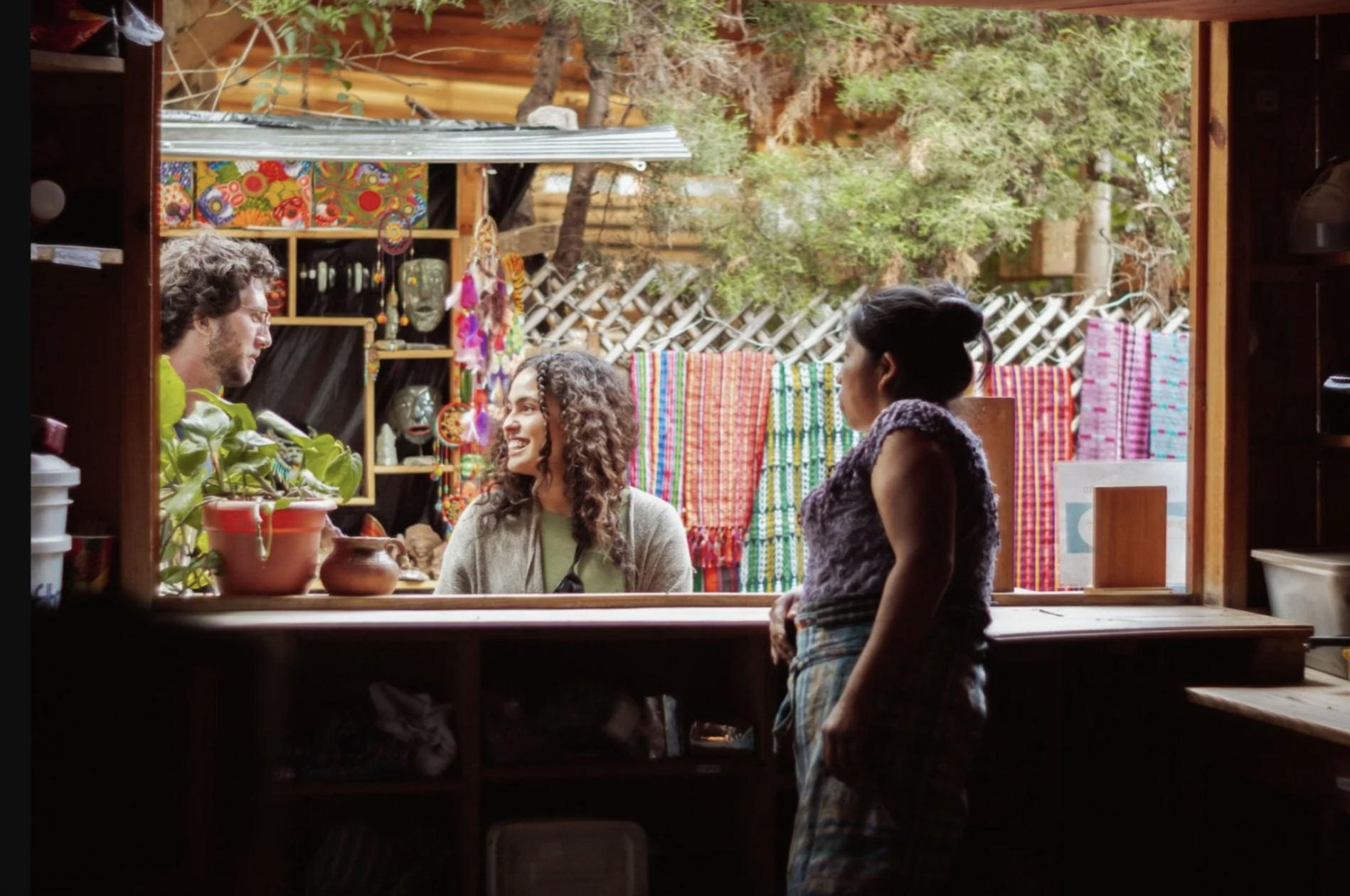 A woman is helping customers at the Konojel nonprofit organization in San Marcos, Guatemala
