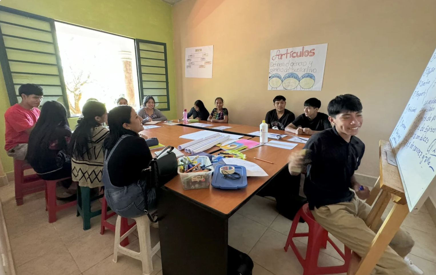 A group of students are learning in a classroom at a nonprofit in Guatemala