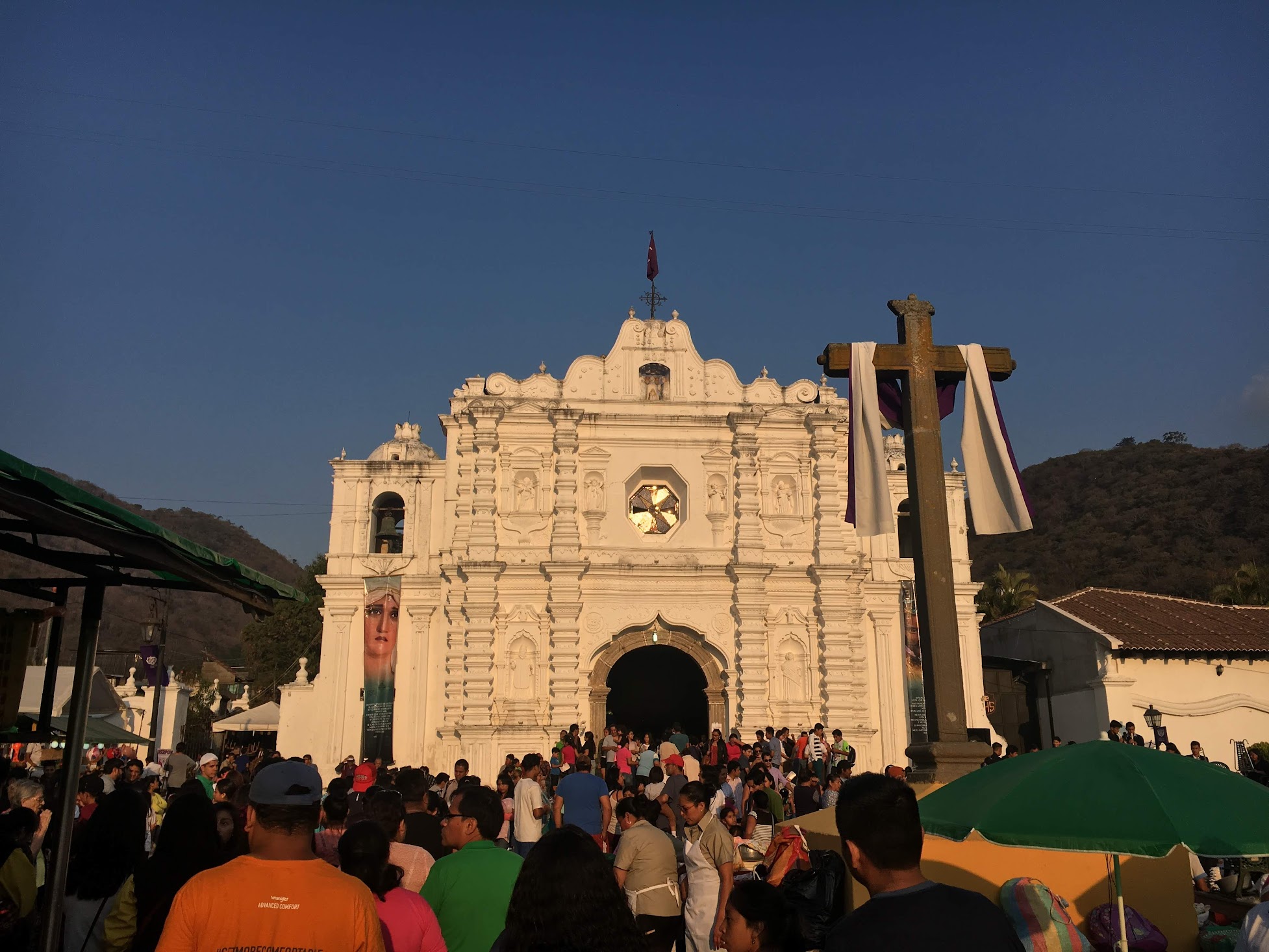 A church with people outside during Semana Santa celebrations in Guatemala