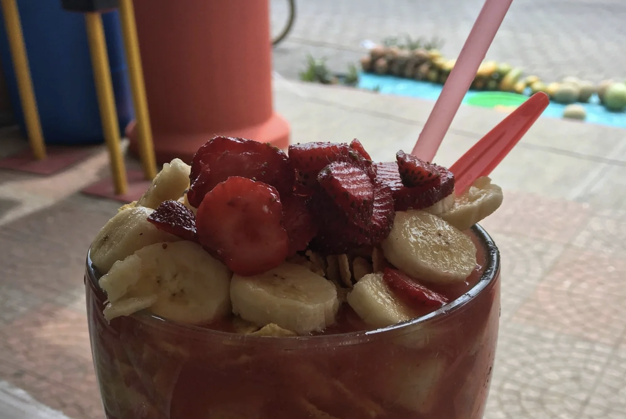 A refreshing beverage that's smoothie like and topped with fresh fruits in Guatemala