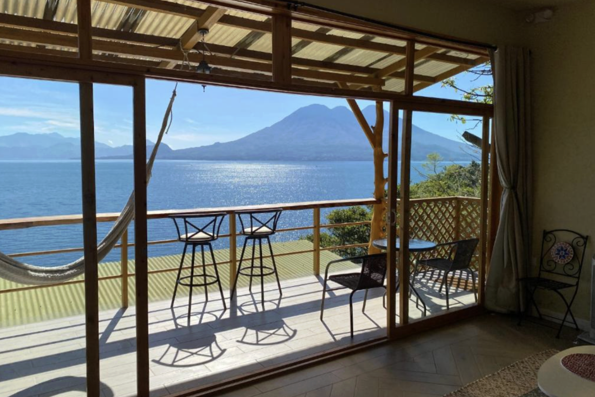 The balcony with seating overlooking at Lake Atitlan at the Maya Moon Lodge