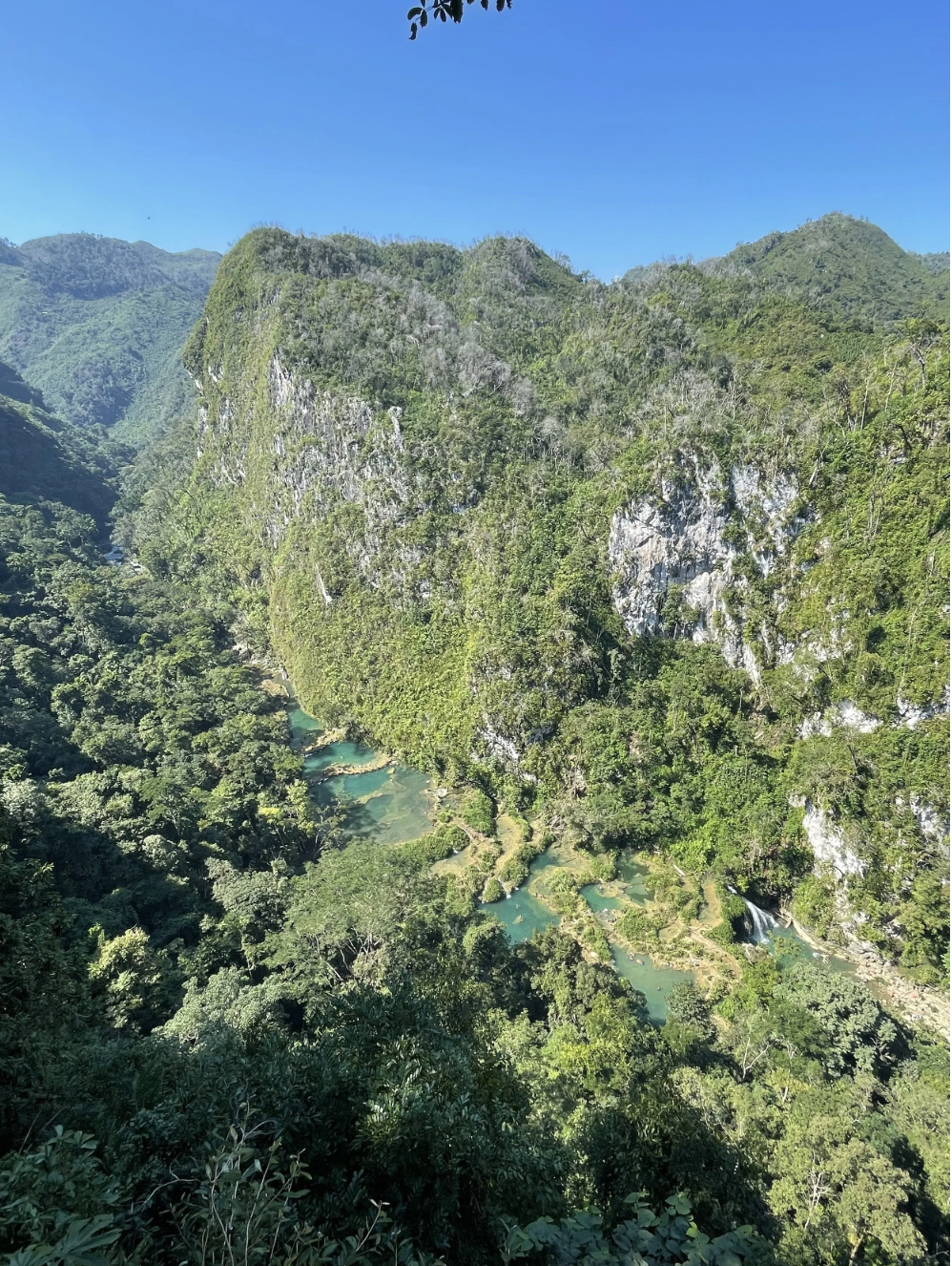 Semuc Champey from above with its green river waters and jungle setting