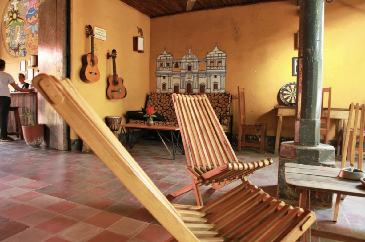 The lobby area of a hotel in Nicaragua with chairs and decorations