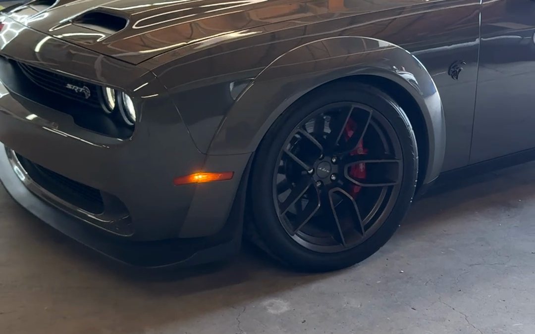 Gray Dodge Challenger SRT with fresh ceramic coating in the Deep Gloss shop