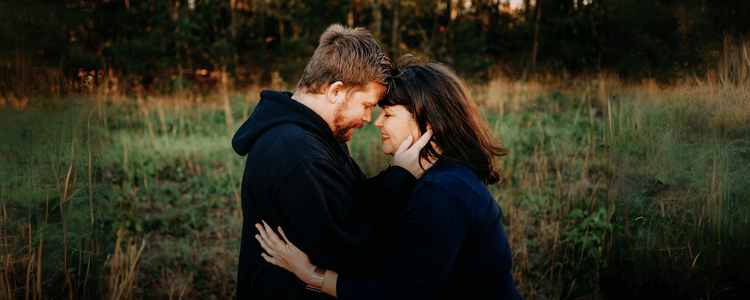 Twin Flame couple holding hands