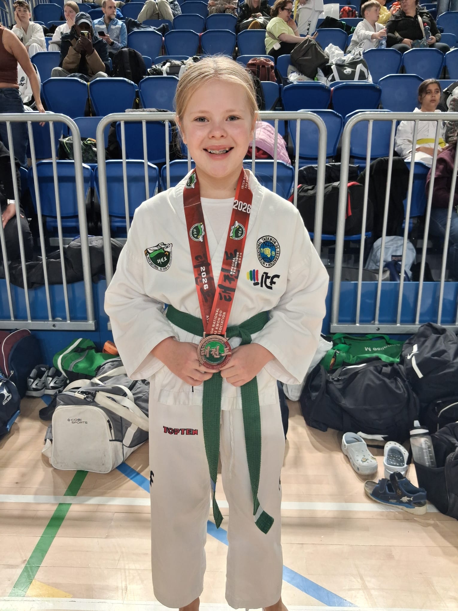 Elite Taekwon-Do Academy students celebrating at the INTA Open Championships
