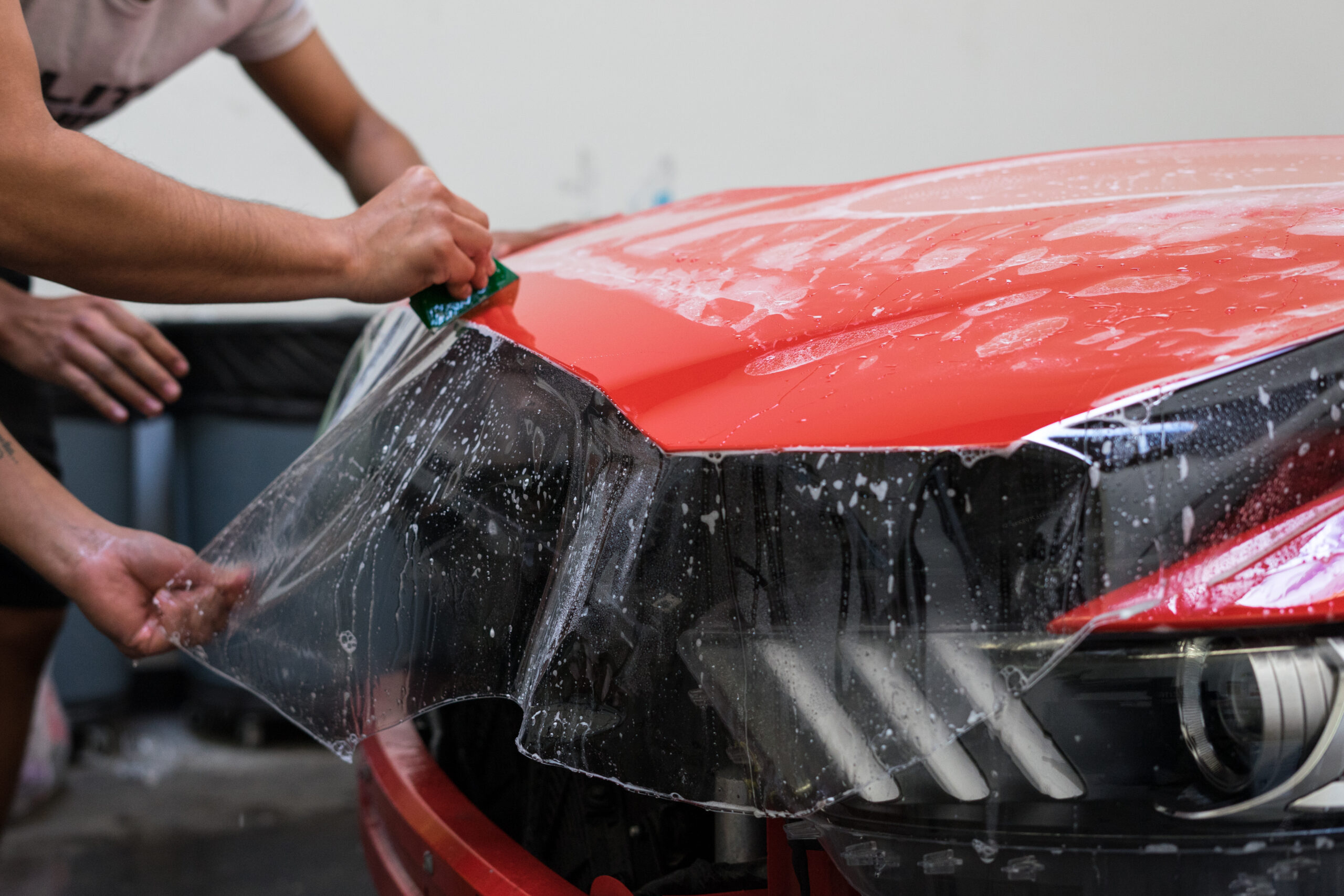 paint protection film being applied in our studio Arroyo Grande etail